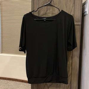 Black blouse with shoulder cut out